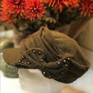Moss green hat with studded bow trim